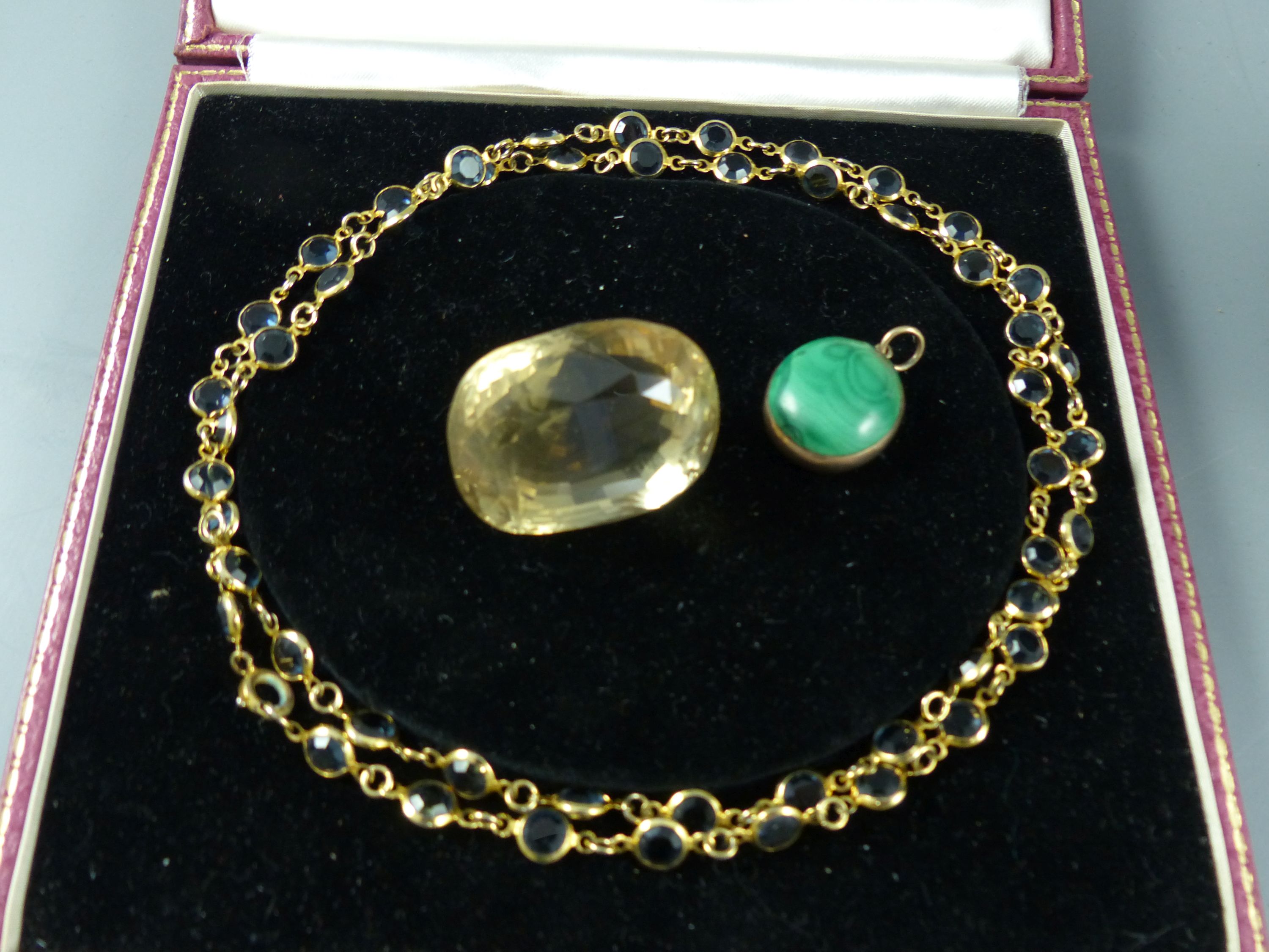 A yellow metal mounted malachite and plaited hair oval pendant, 21mm, gross 6.4 grams, citrine & 2 paste necklaces.